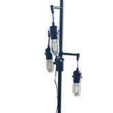 Modern floor lamp with three exposed light bulbs